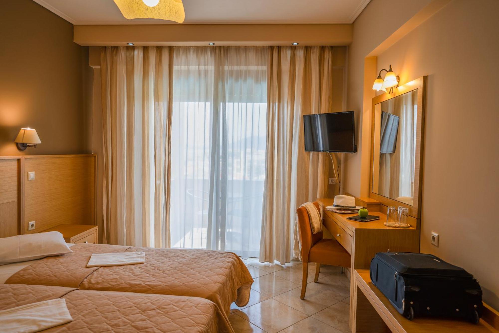 Evia Hotel & Suites Marmari  Extérieur photo