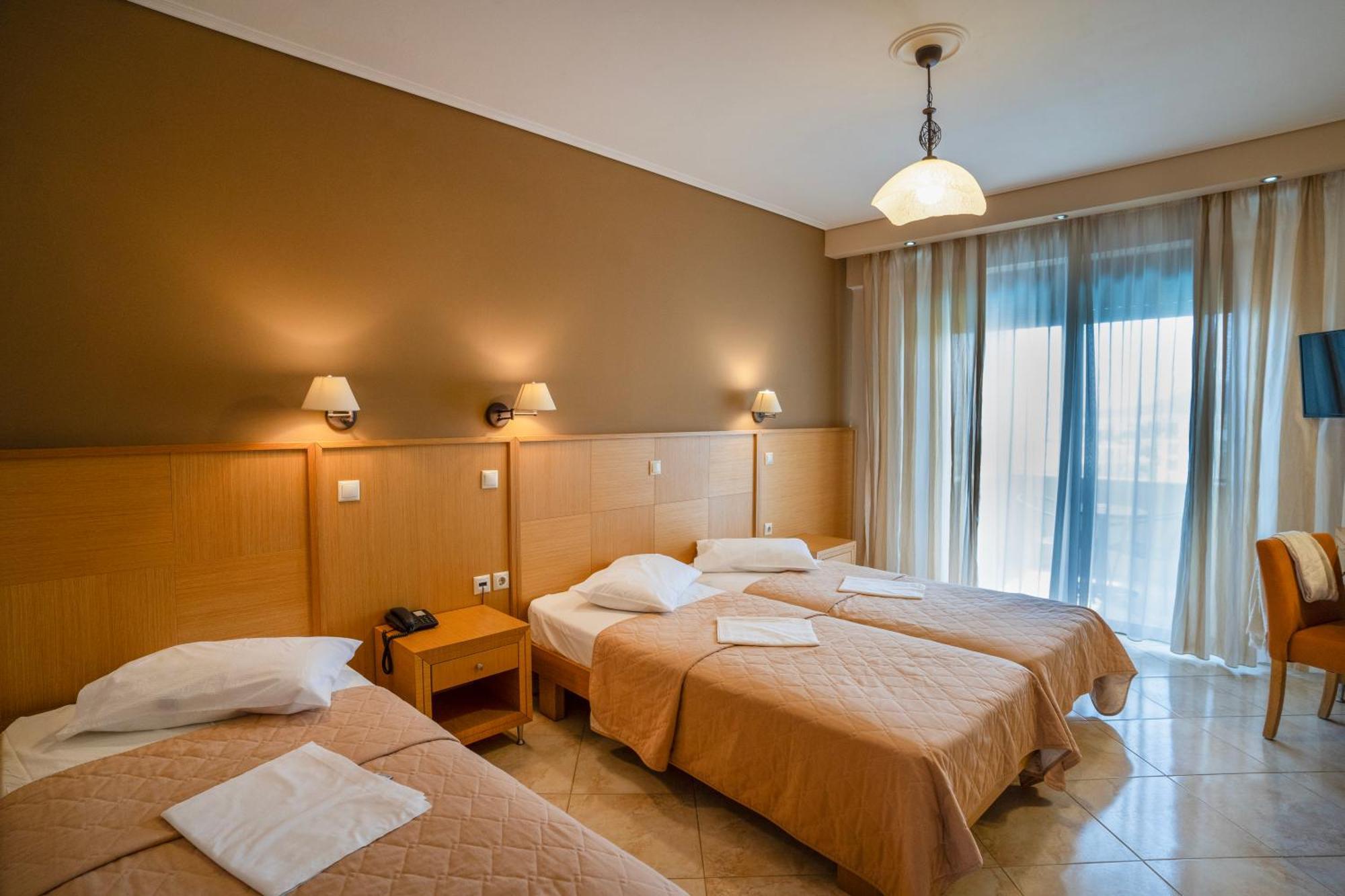 Evia Hotel & Suites Marmari  Extérieur photo